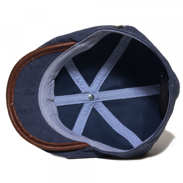 Détail de la visière gansée imitation cuir marron