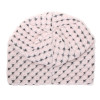 bonnet pincé derrière